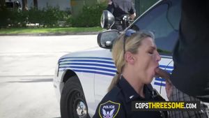 Milf cop sucks on criminals balls while